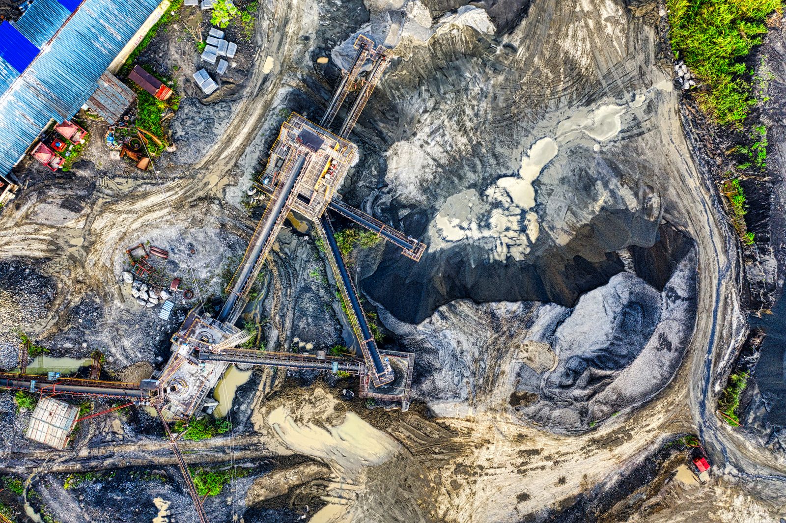 Aerial view of mineral processing equipment and stockpiles