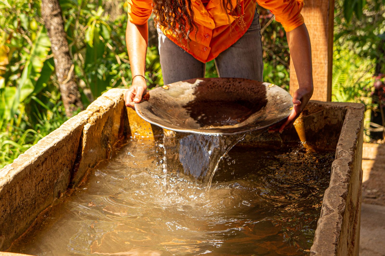 Worker processing mineral material at a mining operation